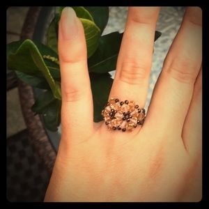 Brown floral beaded plastic ring